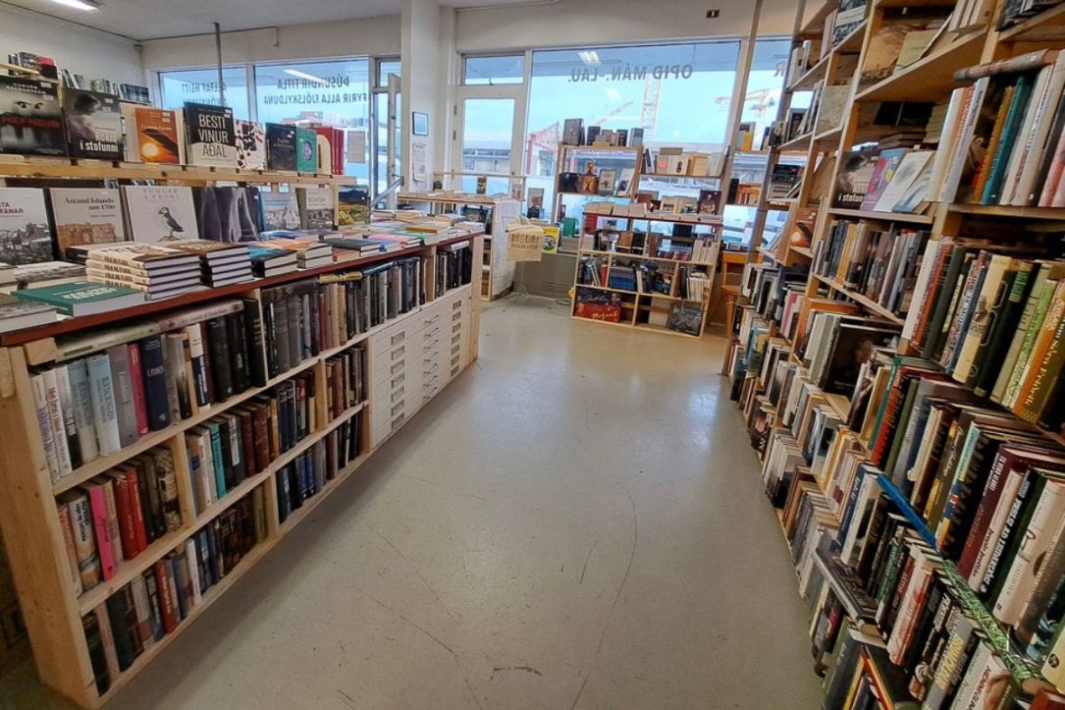 Interior of Bókakaffið book store with Icelandic and English books in Reykjavík