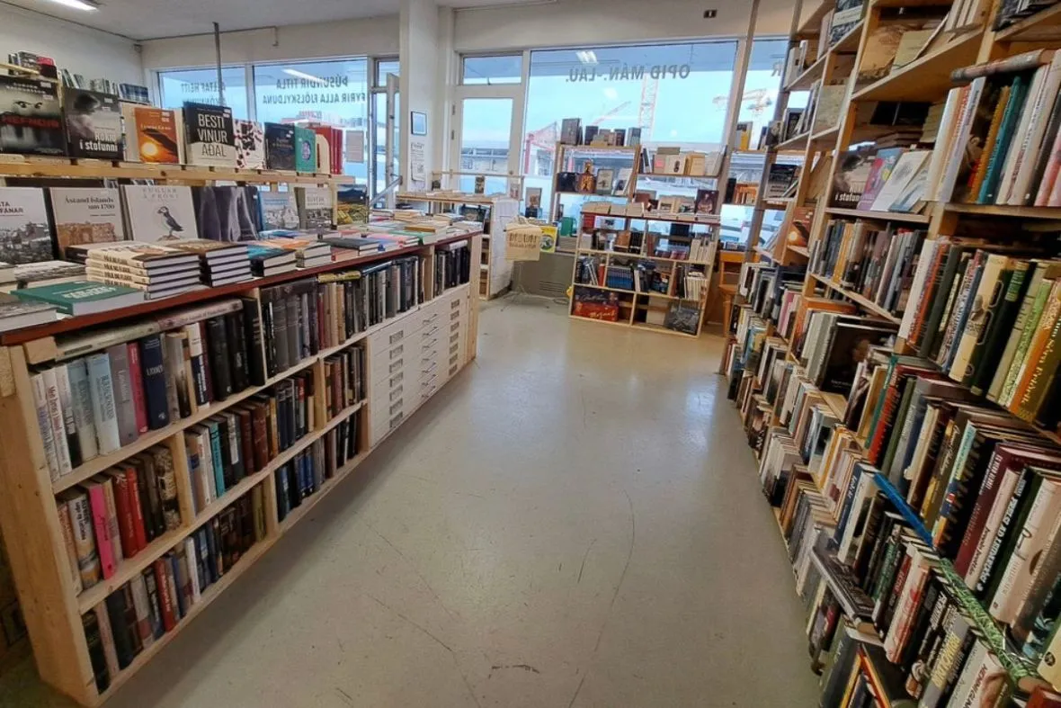 Interior of Bókakaffið book store with Icelandic and English books in Reykjavík