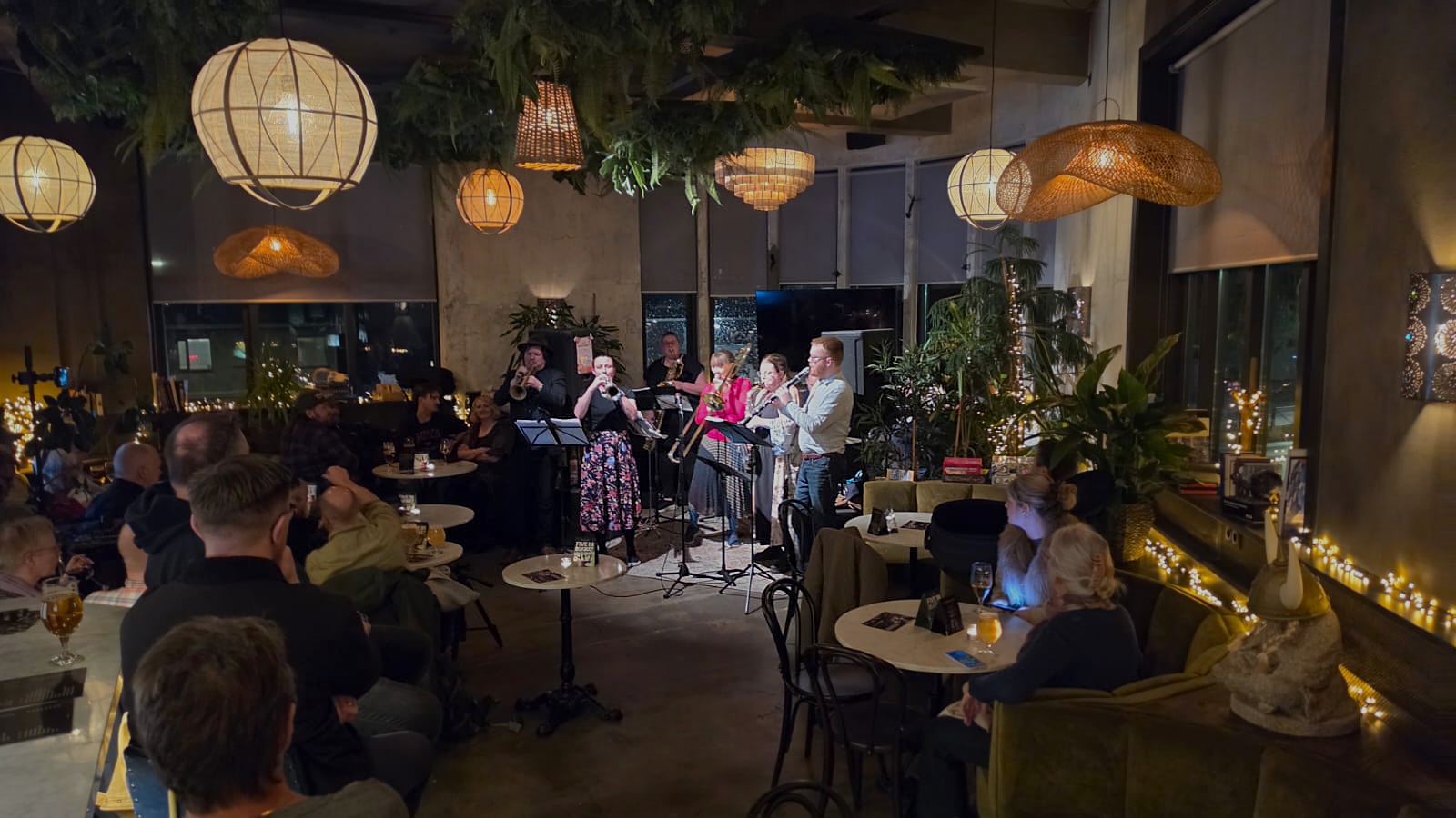 Brass band playing live for guests in the snorrabar lounge