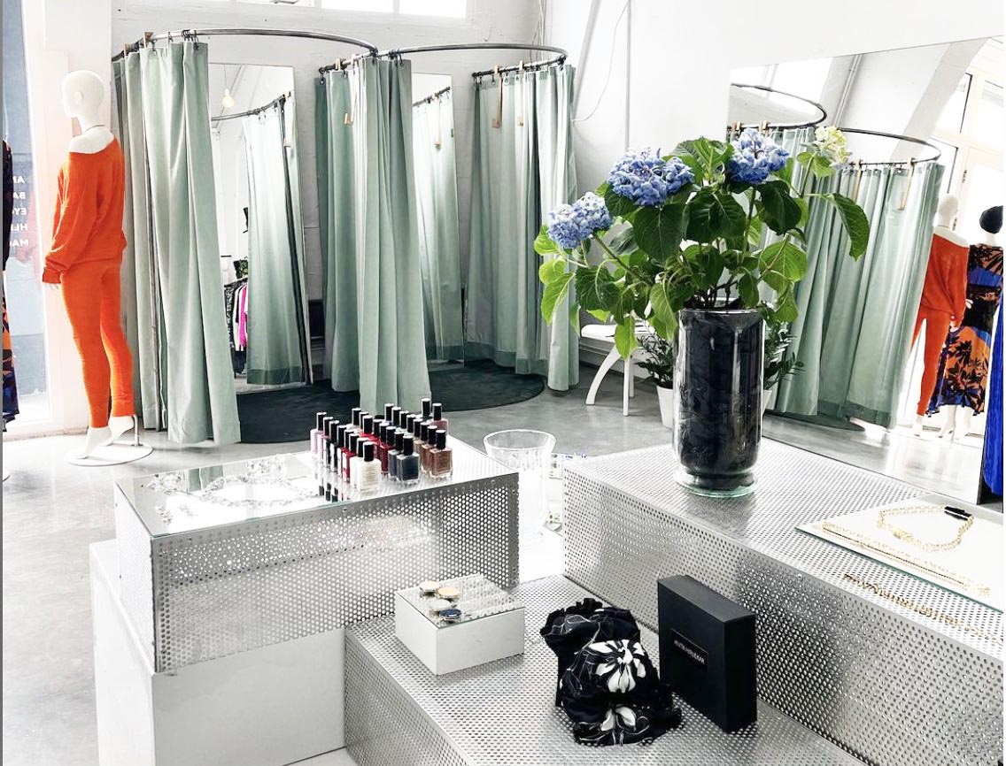 Designer fitting rooms and curated accessories at Kiosk Reykjavik.