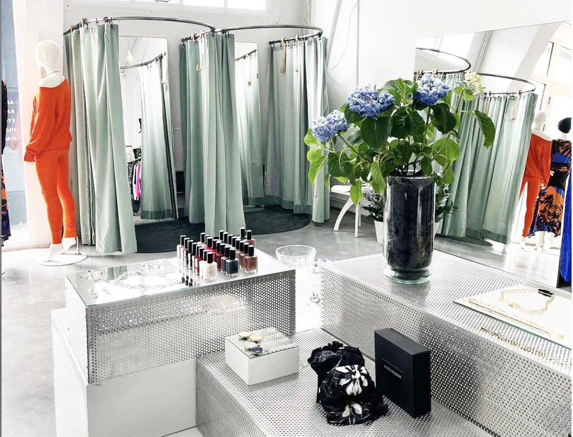 Designer fitting rooms and curated accessories at Kiosk Reykjavik.