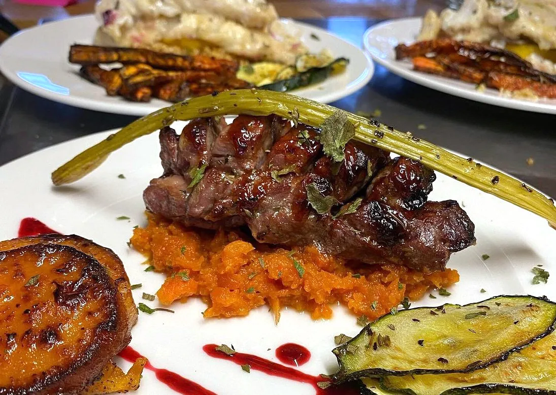 A sophisticated meat and vegetable dish served at Eyri Restaurant in Hjalteyri.