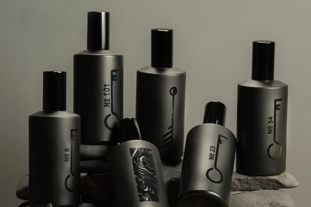 A collection of Fischersund signature perfumes in minimalist matte black bottles in Reykjavik.