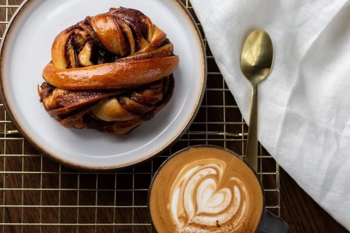 Cinnamon roll and specialty coffee at Hygge Café in Reykjavik.