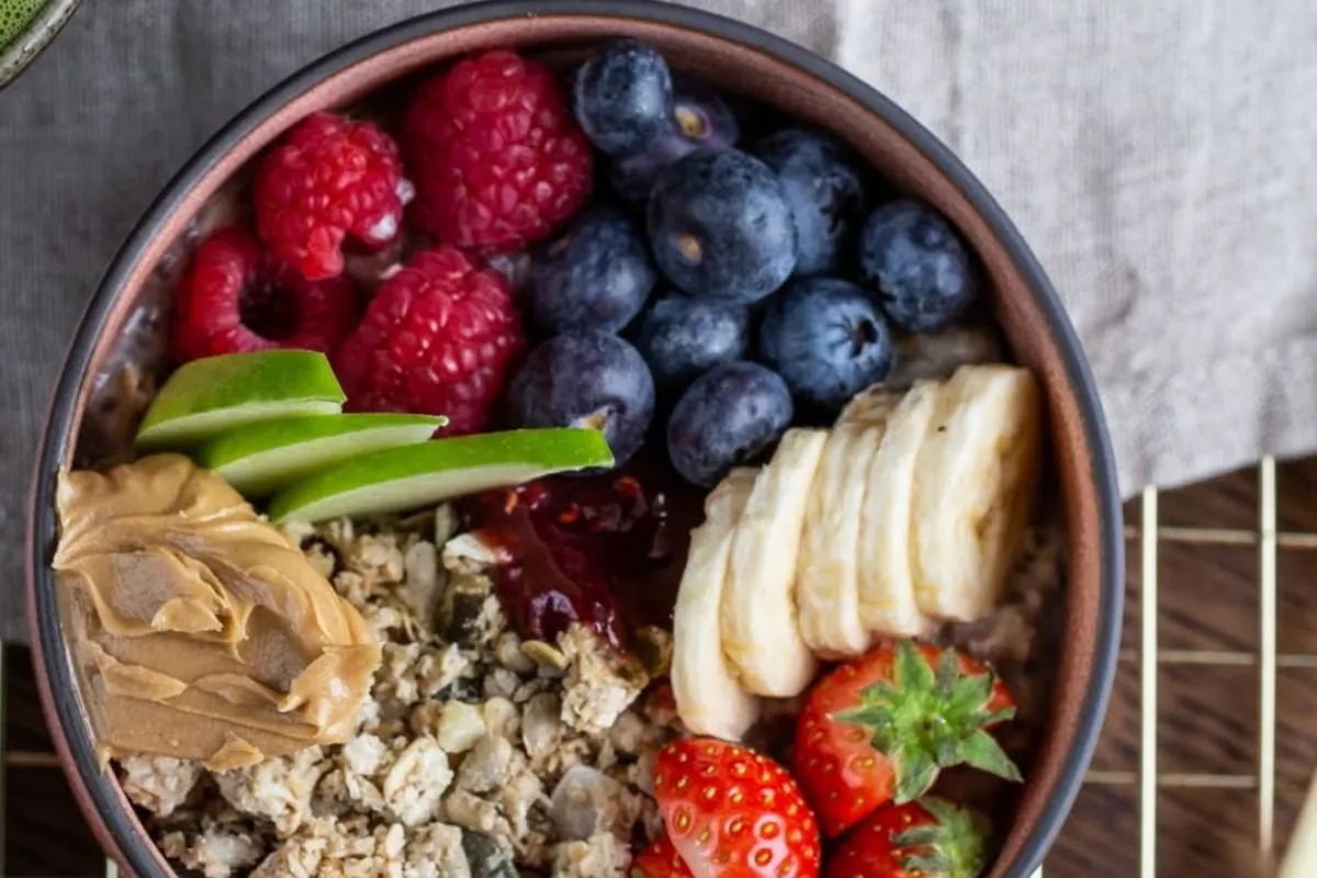 Healthy breakfast bowl with Icelandic skyr, strawberries, blueberries, and granola at Hygge Café.