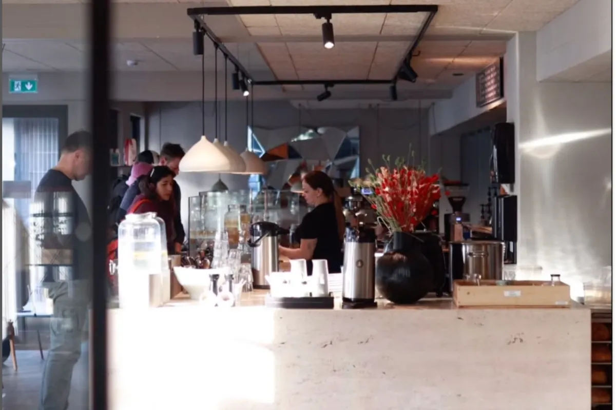 A warm and inviting view of the pastry counter at Hygge Café & Micro Bakery in Reykjavik.