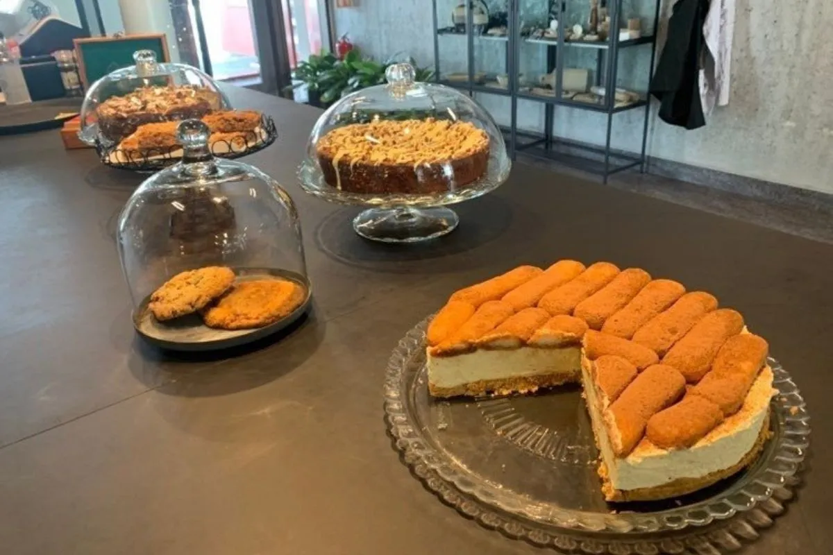 An assortment of gourmet cakes and cookies on display at Kastalakaffi Reykjavik.