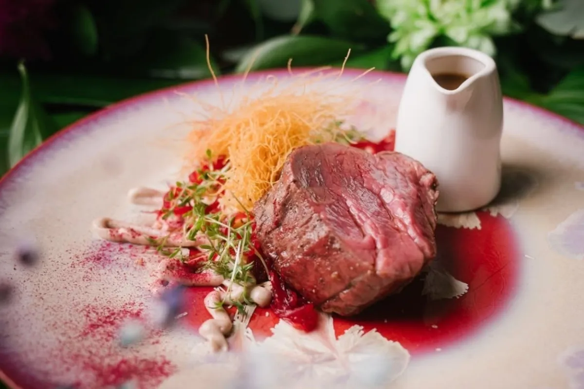 Gourmet beef tenderloin with modern Icelandic garnishes at KOL restaurant in Reykjavik.