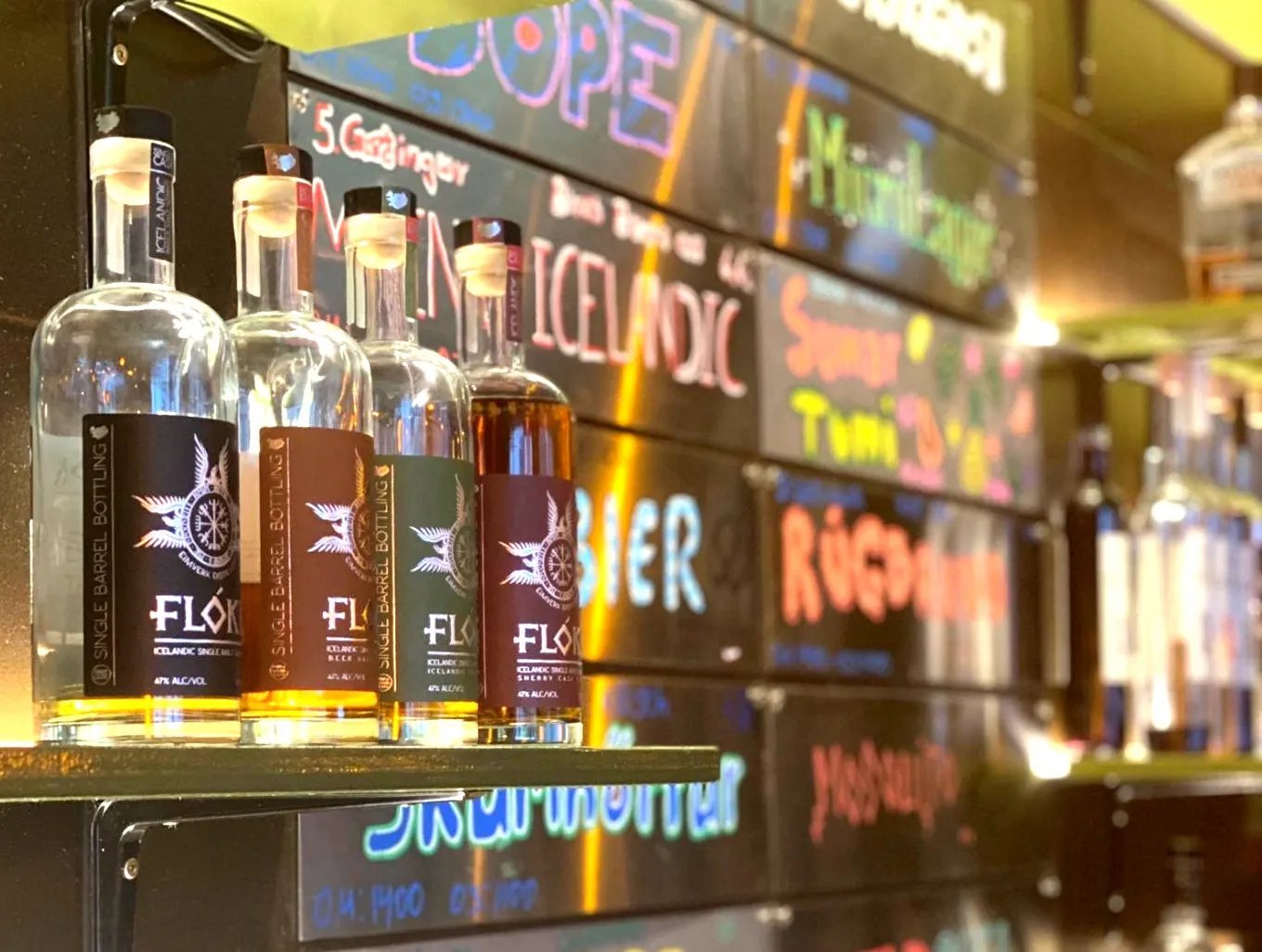 Flóki Icelandic whiskey bottles at Microbar Reykjavik craft beer bar.