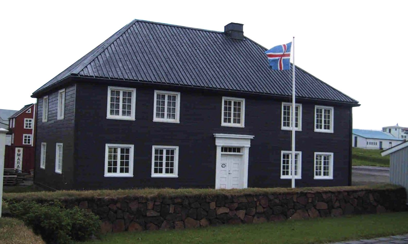 Building exterior of The Norwegian House in Stykkishólmur, West Iceland, recommended by Handpicked Iceland.