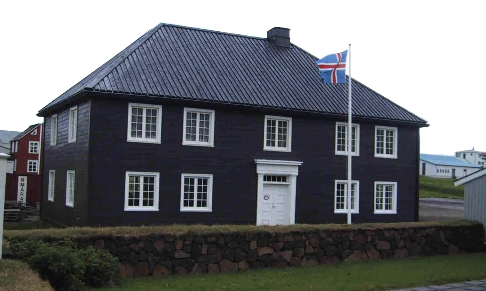 Building exterior of The Norwegian House in Stykkishólmur, West Iceland, recommended by Handpicked Iceland.