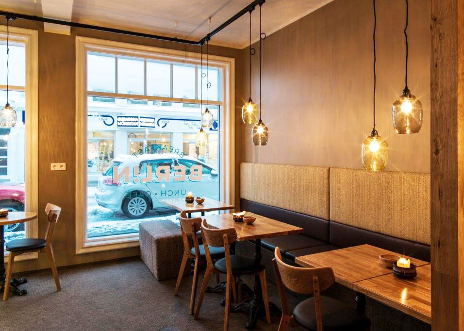 Warm cafe interior at Berlin Café in Akureyri.