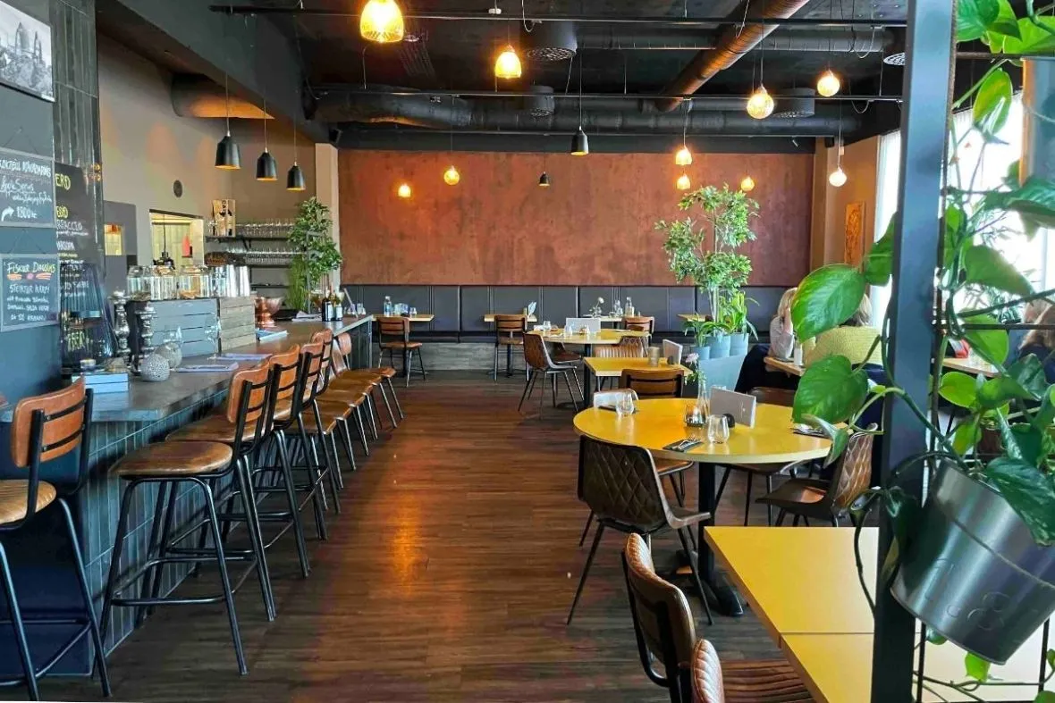 The spacious dining room and cocktail bar at Brasserie Kársnes in Reykjavik.