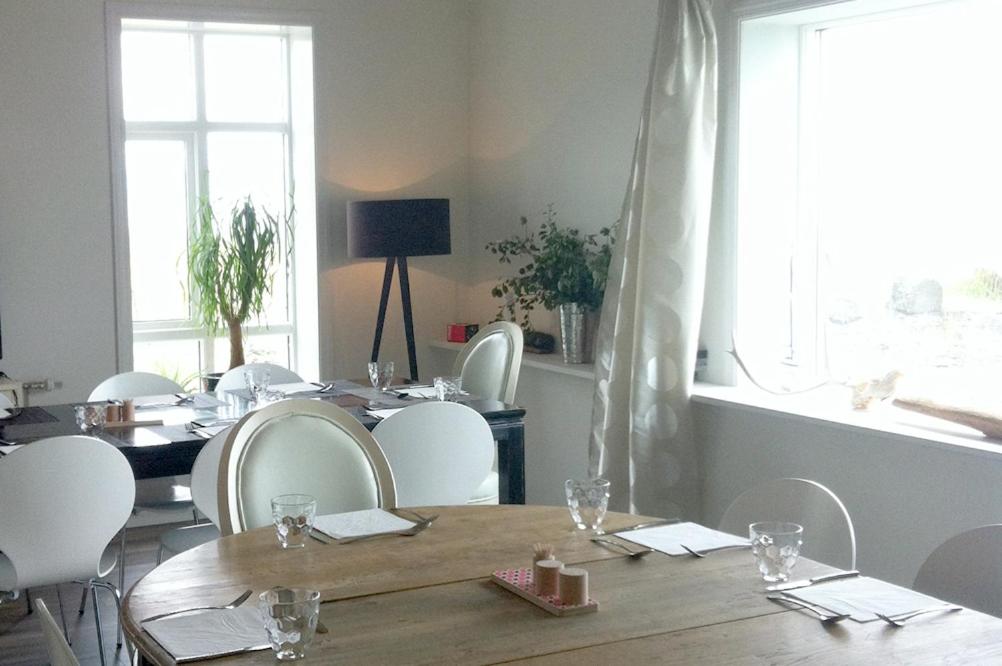 Interior and dining setting at Brimslóð Atelier in Blönduós, recommended by Handpicked Iceland.