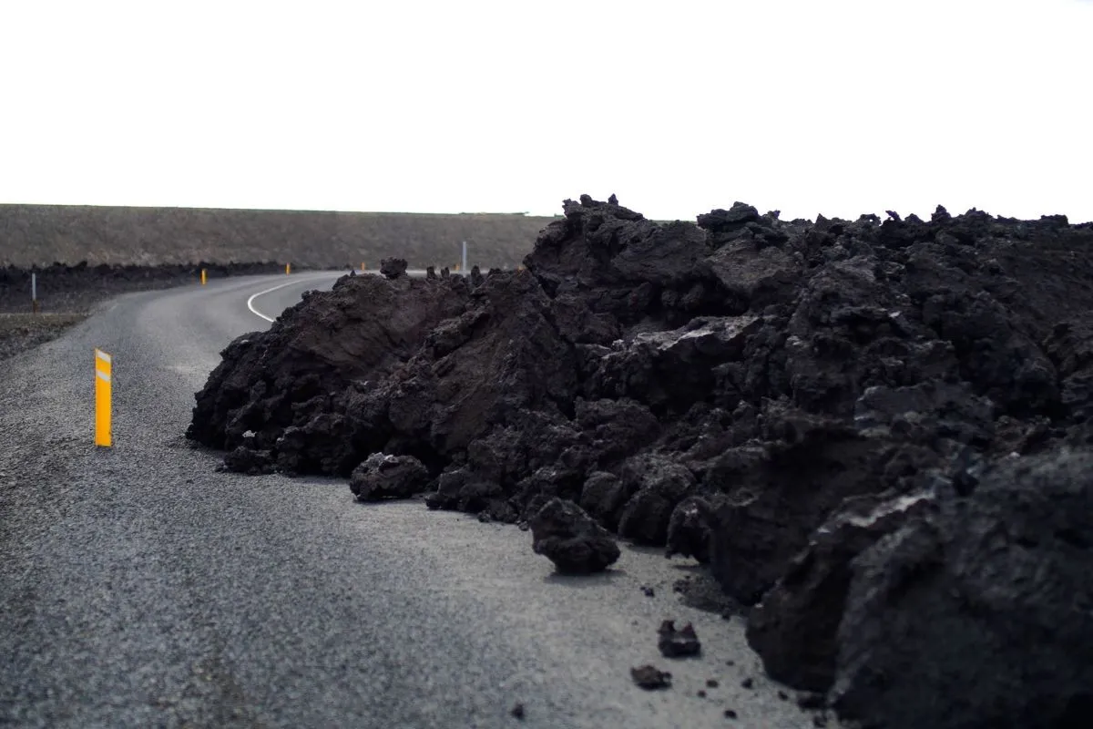 Road winding through the volcanic lava fields near Grindavík