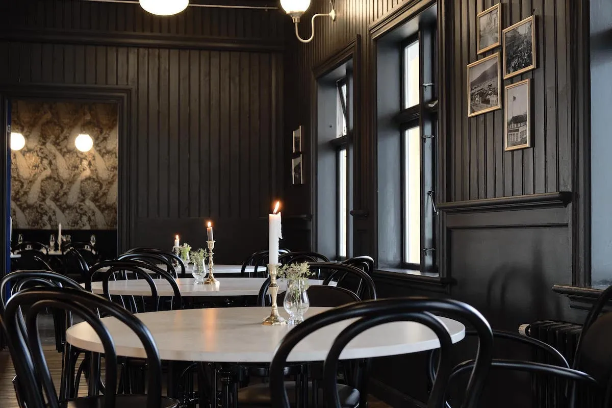 Interior dining area at Eyja Wine Bar and Bistro, Akureyri.