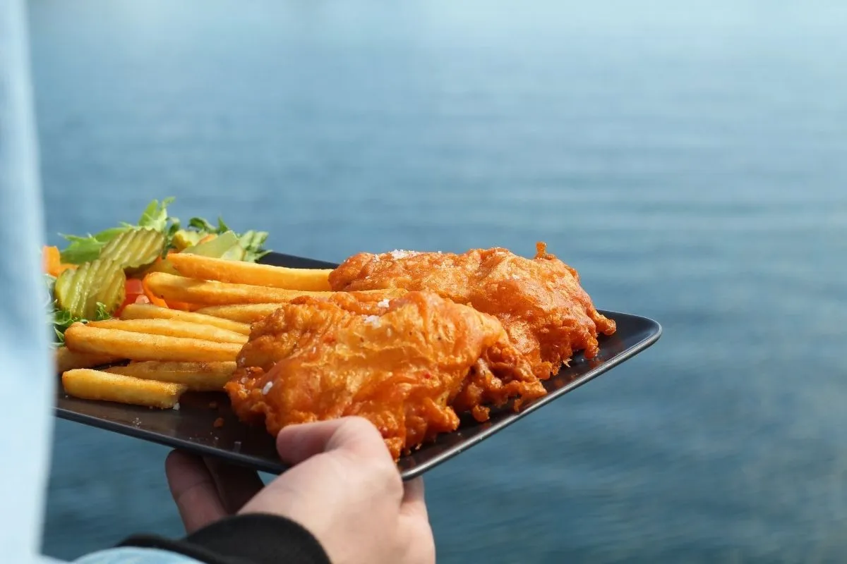 Authentic fish and chips at Grandi Foodhall enjoyed by the Old Harbor waterfront in Reykjavik.