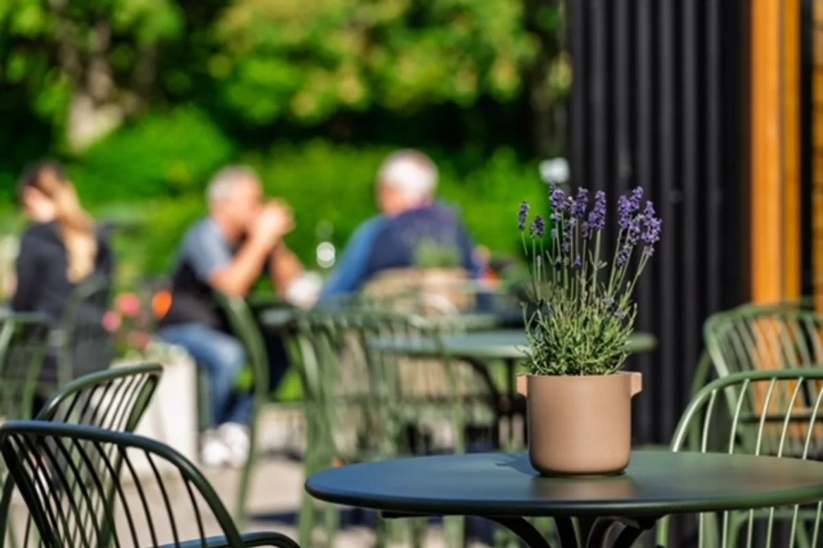 Outdoor terrace seating at LYST restaurant in Akureyri.
