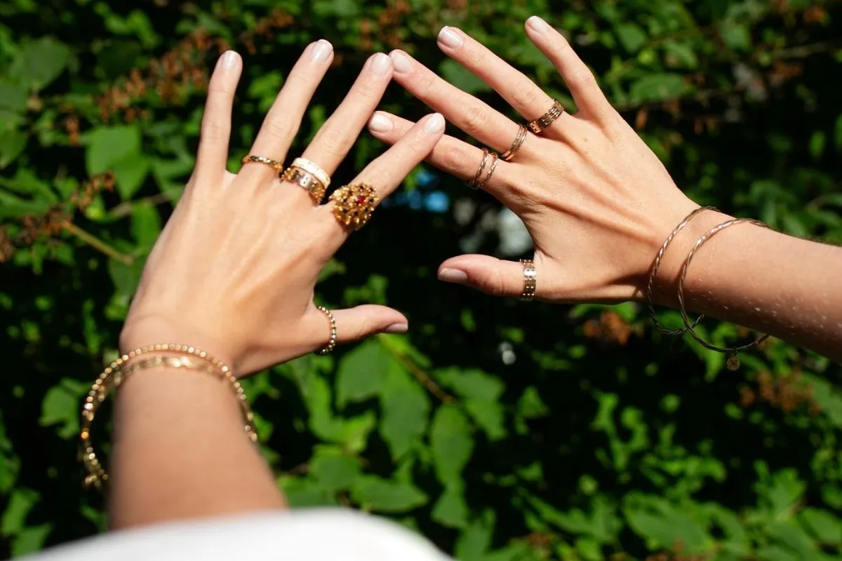 Handcrafted gold rings and bracelets by Hildur Hafstein Jewelry, inspired by Icelandic nature and bohemian design.