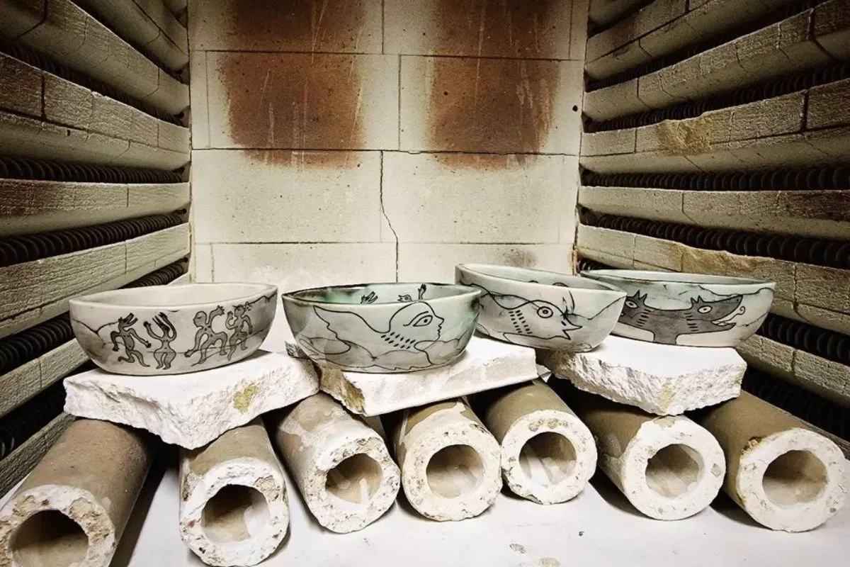 Close-up of Kogga figurative ceramic sculptures, including 