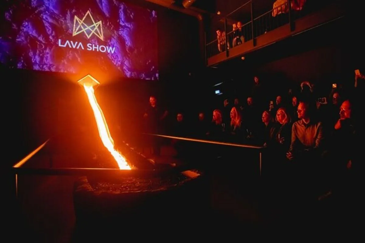 Molten lava flowing down a chute during a live demonstration at Lava Show in Reykjavik.