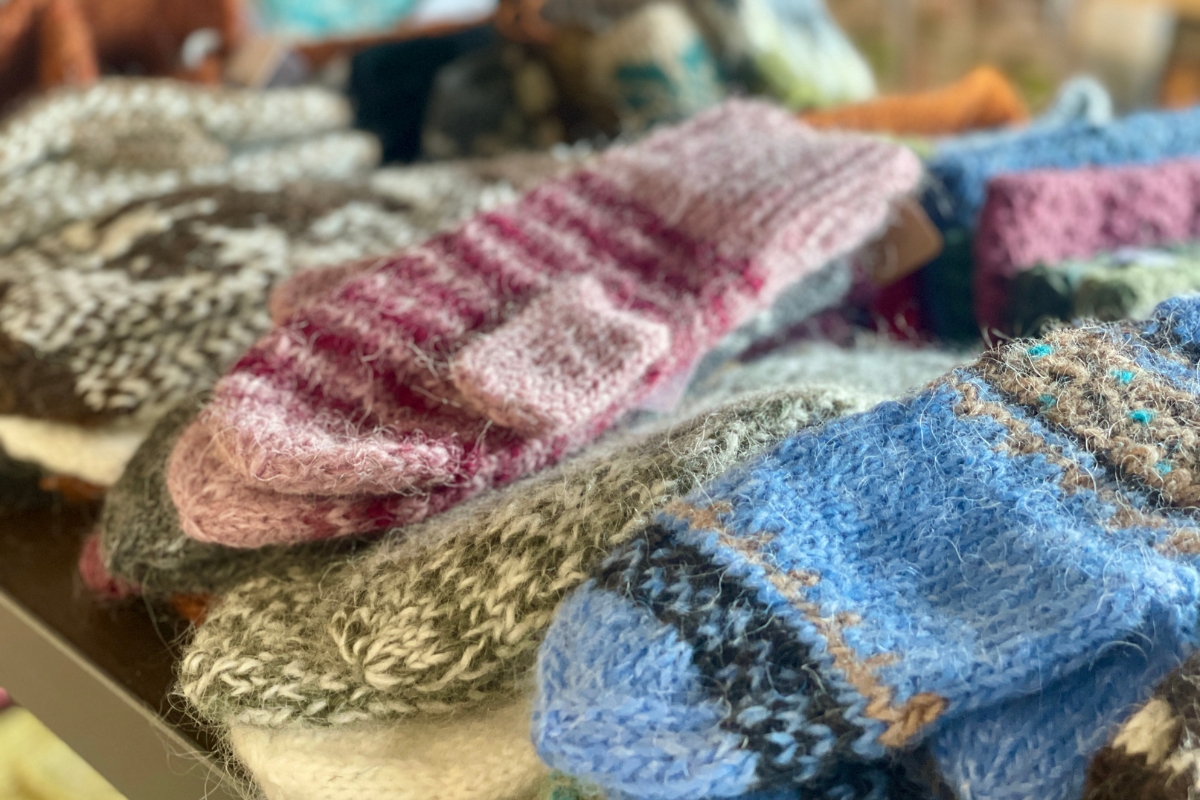 Colorful handmade wool mittens and gloves at Ljómalind