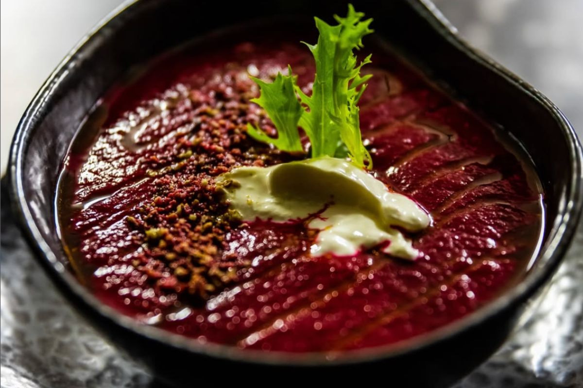 Beetroot soup with cream and garnish at Midgard Restaurant, Hvolsvöllur.