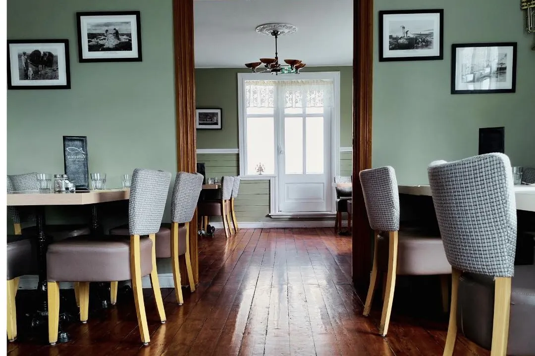 Interior dining area at Naustið Seafood Restaurant in Húsavík.