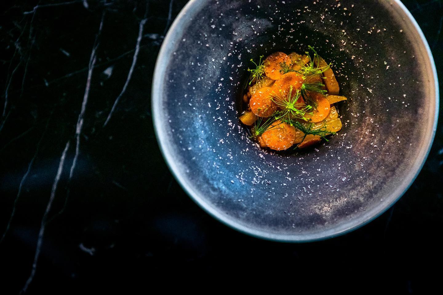 Glazed carrot vegetable dish with dill at North Restaurant in Akureyri.