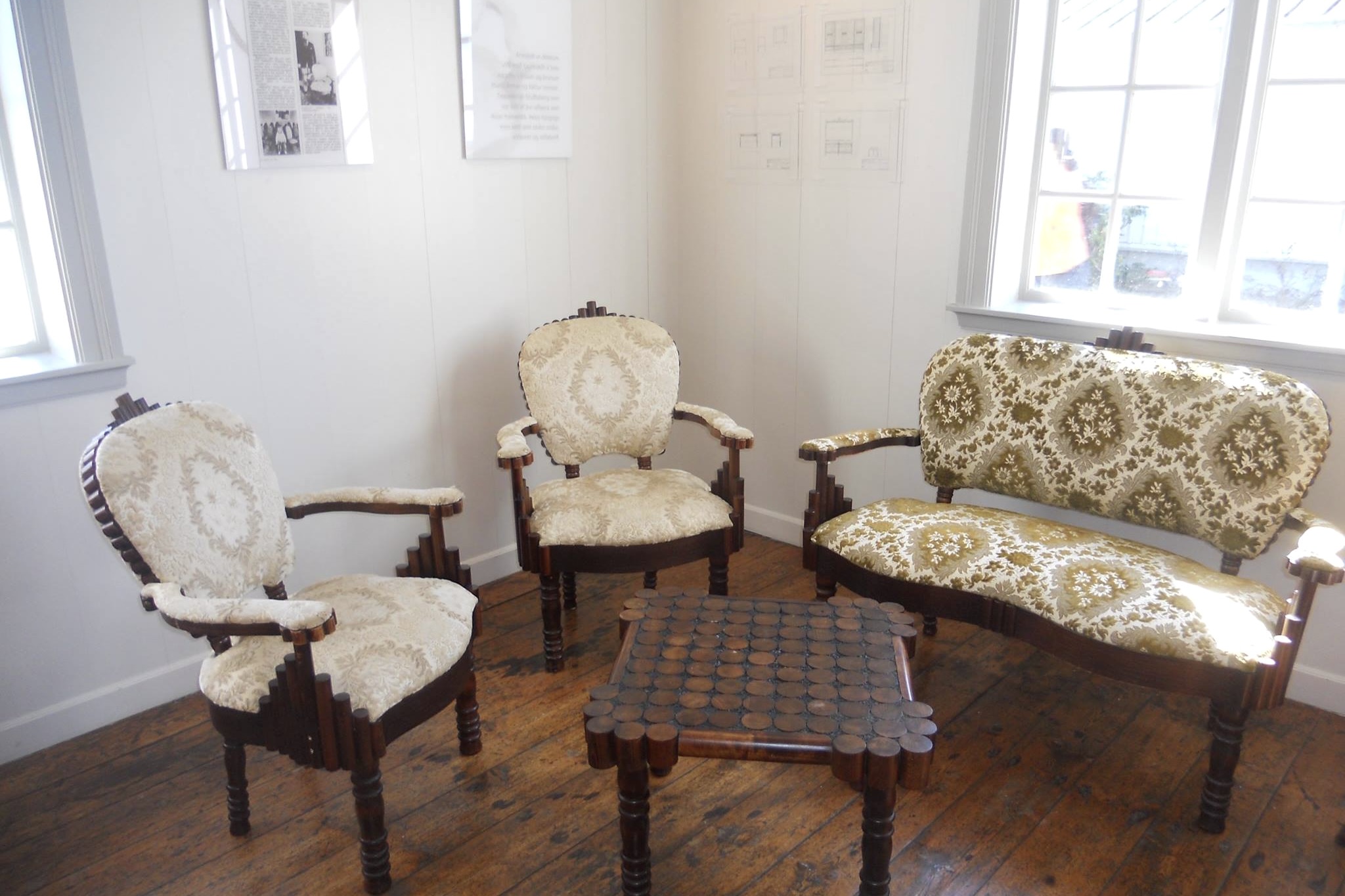 Interior decor of the historic Norwegian House in West Iceland, showcasing antique furniture.