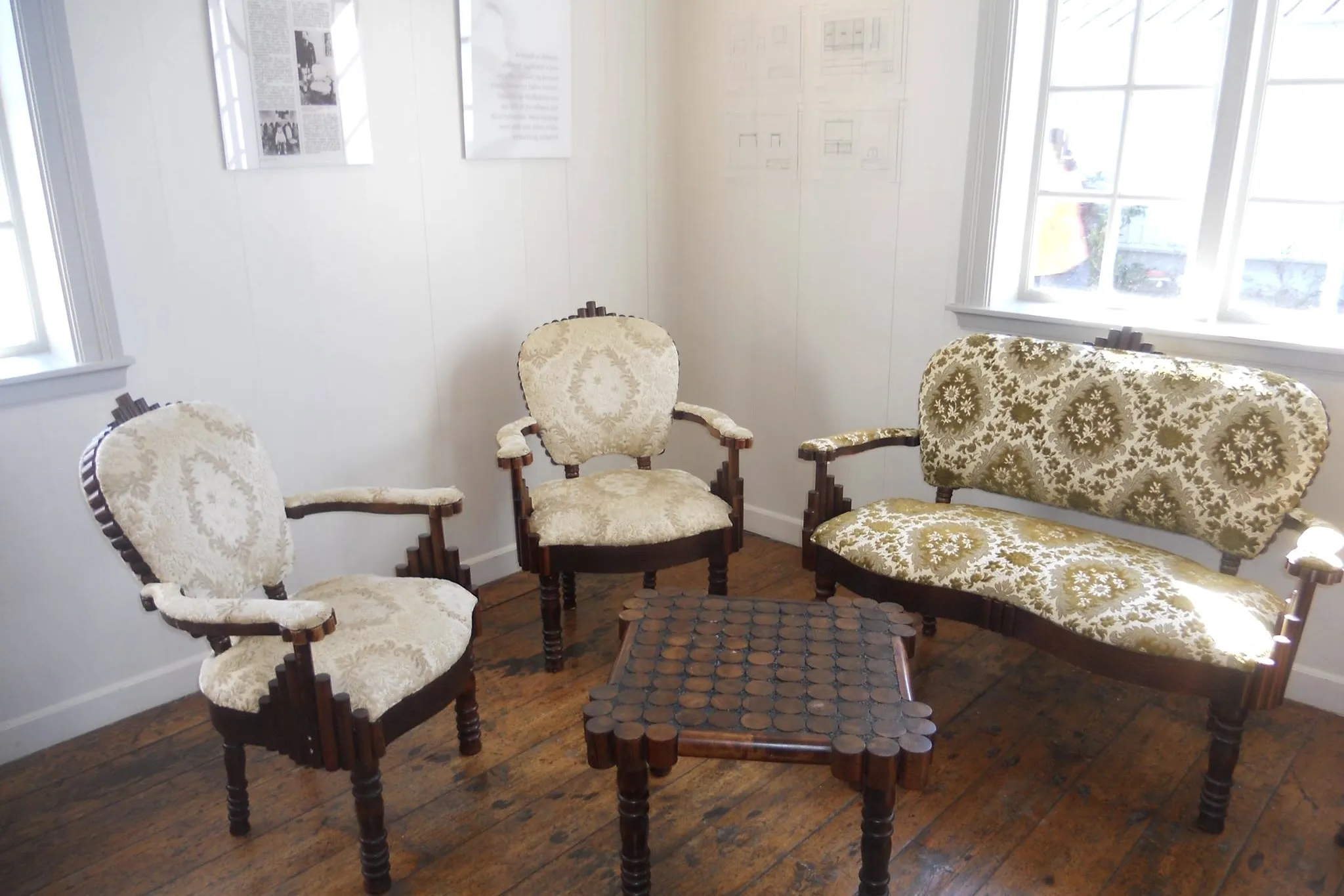 Interior decor of the historic Norwegian House in West Iceland, showcasing antique furniture.