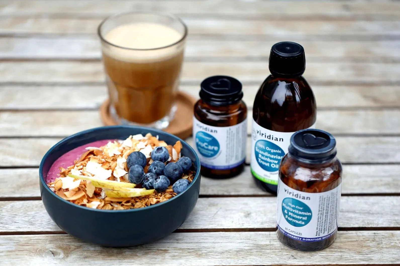 Organic smoothie bowl with blueberries and Viridian supplements at Sisterhood organic café in Reykjavik.