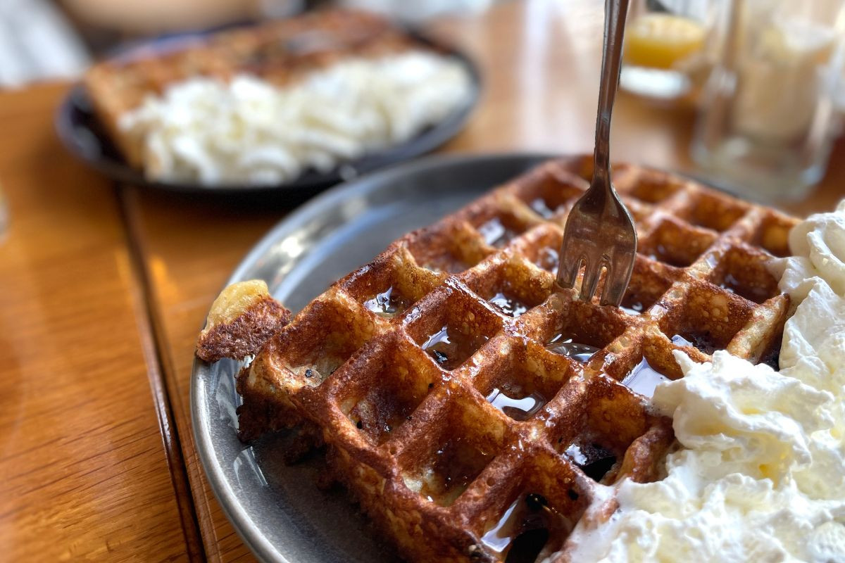 Sweet breakfast waffle and whipped cream, Berlin Café, Akureyri, Iceland.