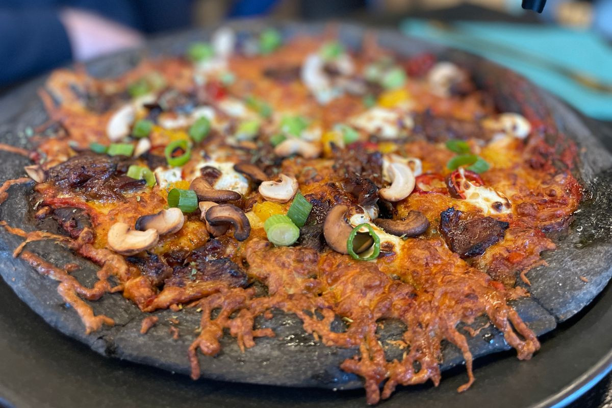 Black Crust signature pizza in Vík, Iceland