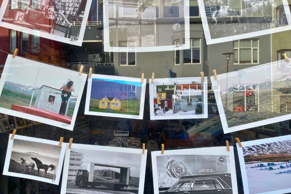 Artistic photography prints displayed in the Fótógrafí shop window