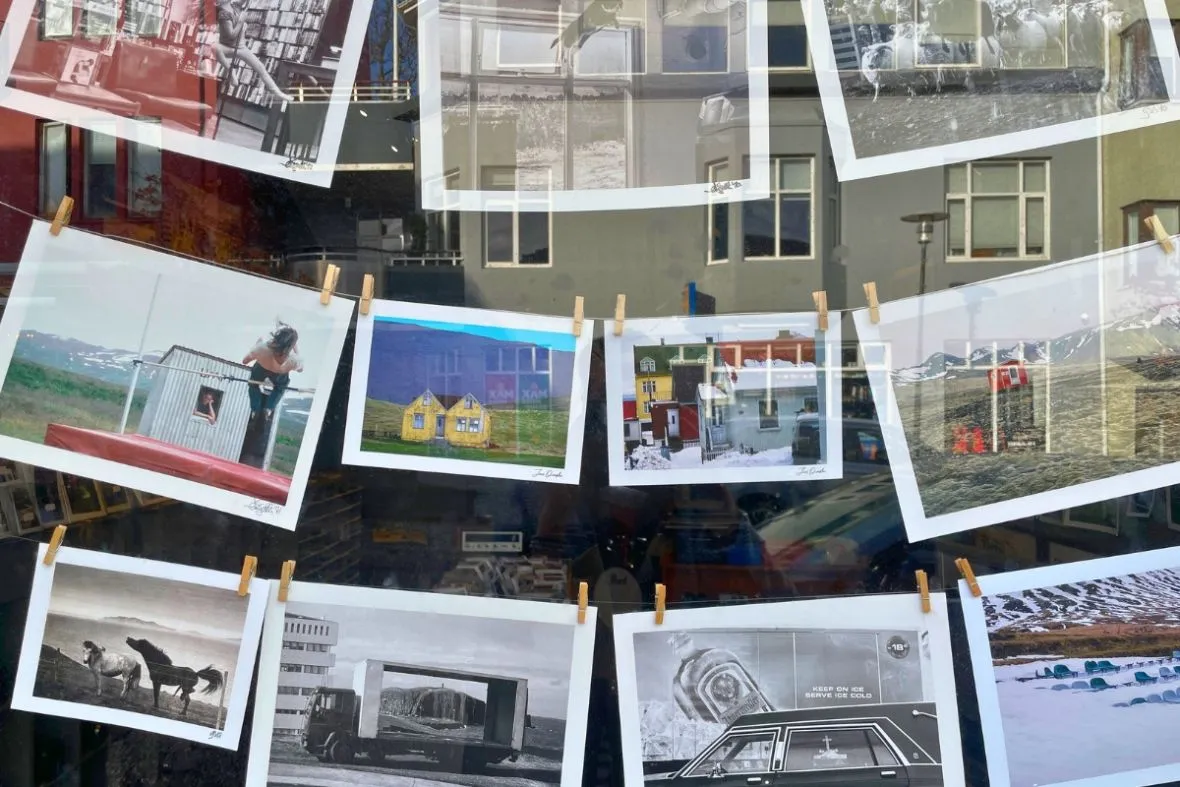 Artistic photography prints displayed in the Fótógrafí shop window