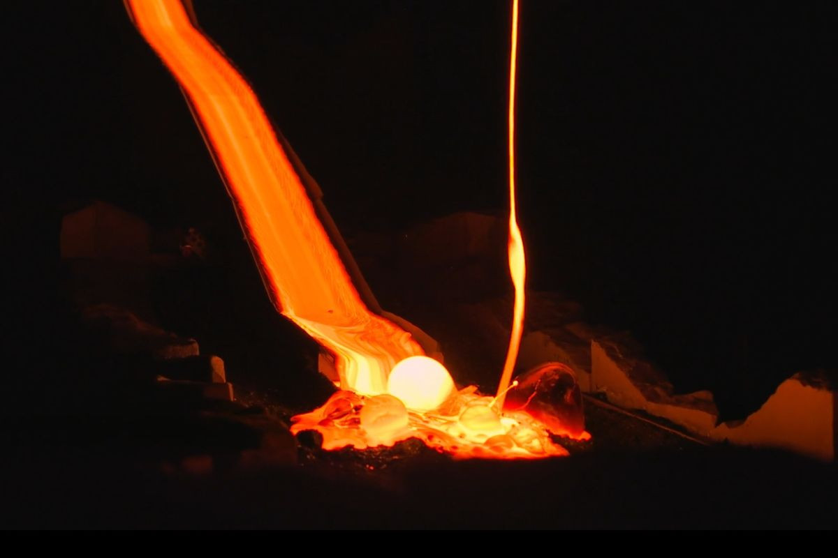Real molten lava flowing over ice at the Lava Show in Iceland.