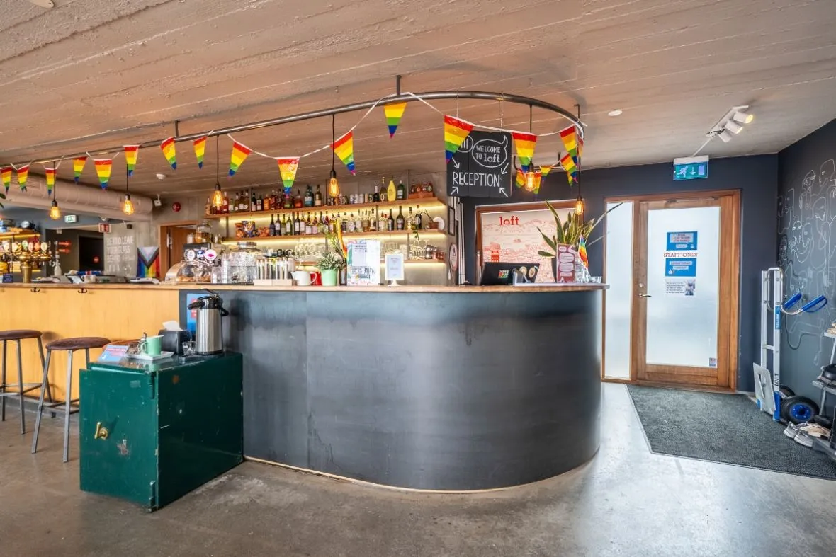 Loft Hostel Bar counter and bar seating area in Reykjavik.