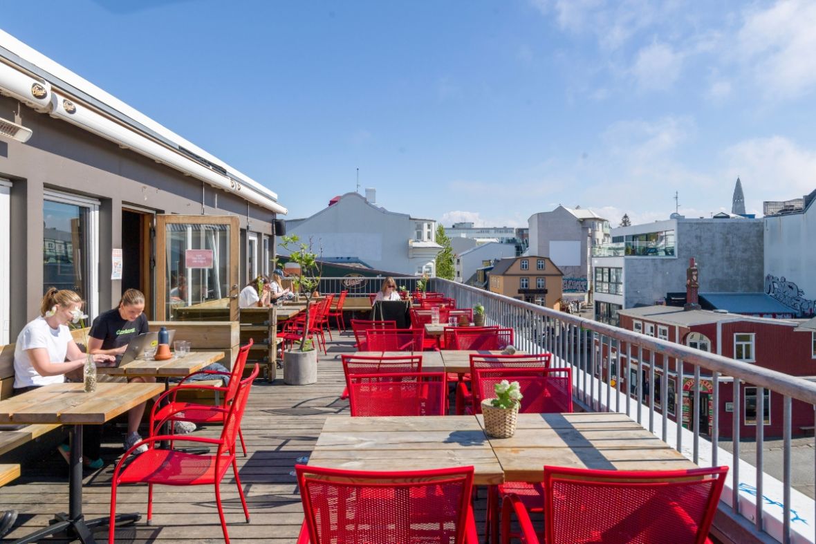 Loft Hostel Bar rooftop terrace and city views in Reykjavik, recommended by Handpicked Iceland.