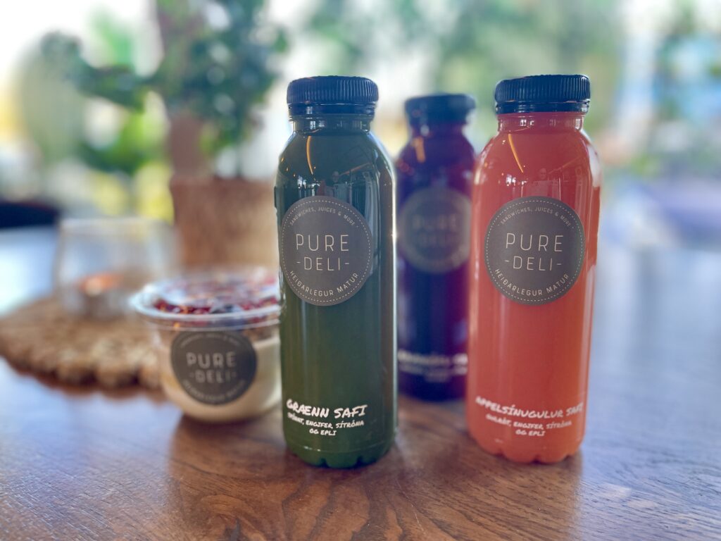 Bottled healthy juices and breakfast yogurt at Pure Deli Reykjavik.