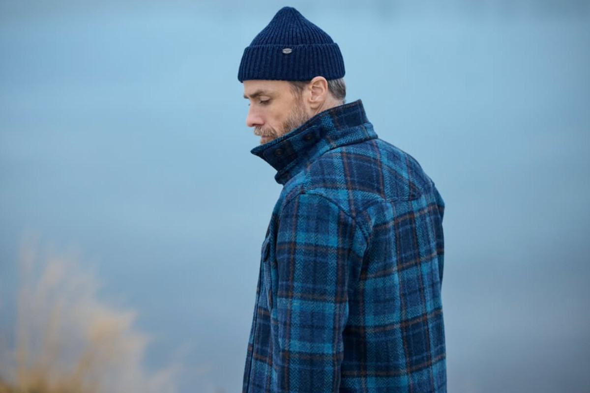 blue and black plaid wool jacket and navy beanie from Farmers & Friends on Laugavegur.