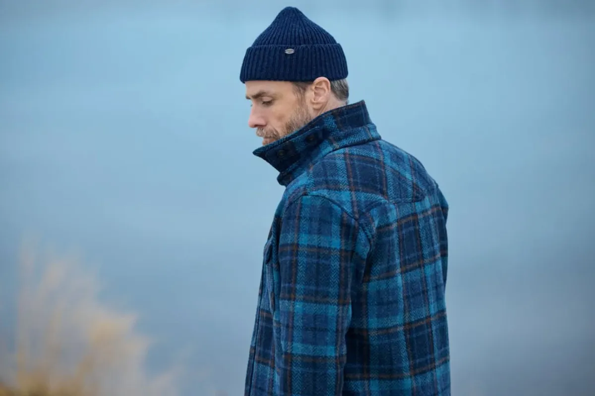 blue and black plaid wool jacket and navy beanie from Farmers & Friends on Laugavegur.