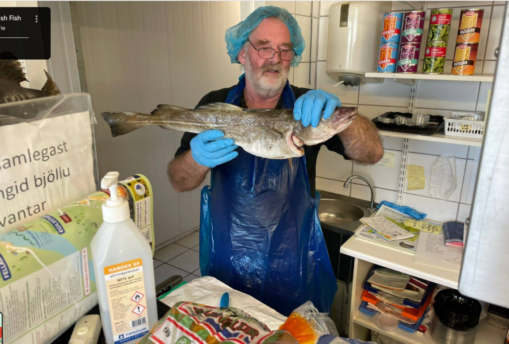 Gestur displaying the catch of the day