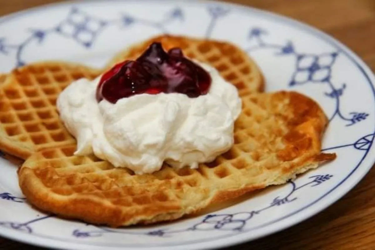 Icelandic waffles with whipped cream and jam at Gróðurhúsið Starrastöðum Cafe.