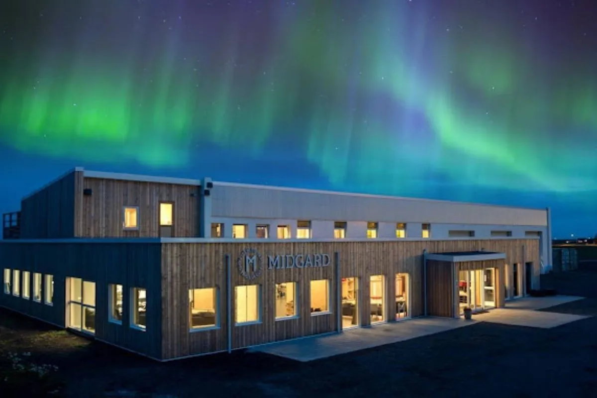 Midgard Restaurant in Hvolsvöllur, Iceland under the Northern Lights, recommended by Handpicked Iceland.
