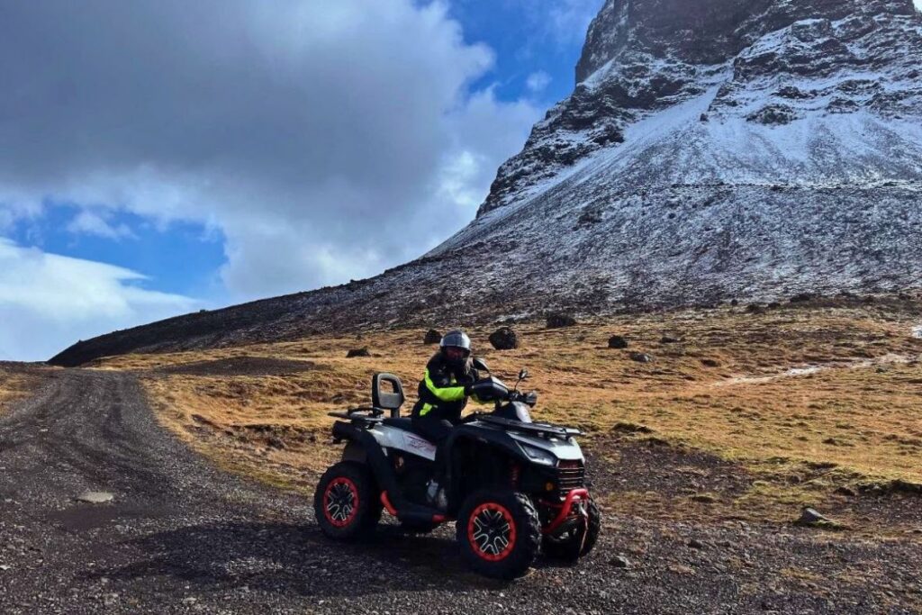 ATV tour through the rugged mountain landscape of the Westfjords, Iceland.