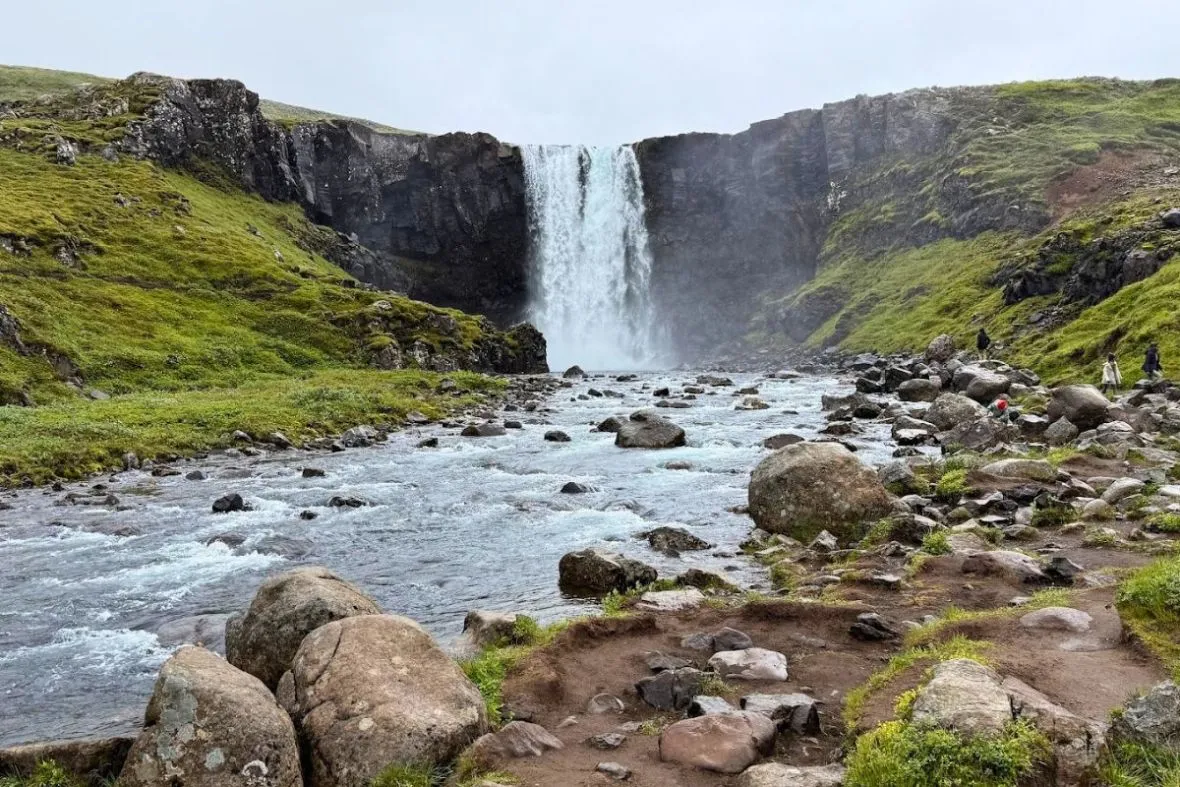 Scenic waterfall stop on an Eastfjords Adventure tour near Seyðisfjörður, East Iceland.