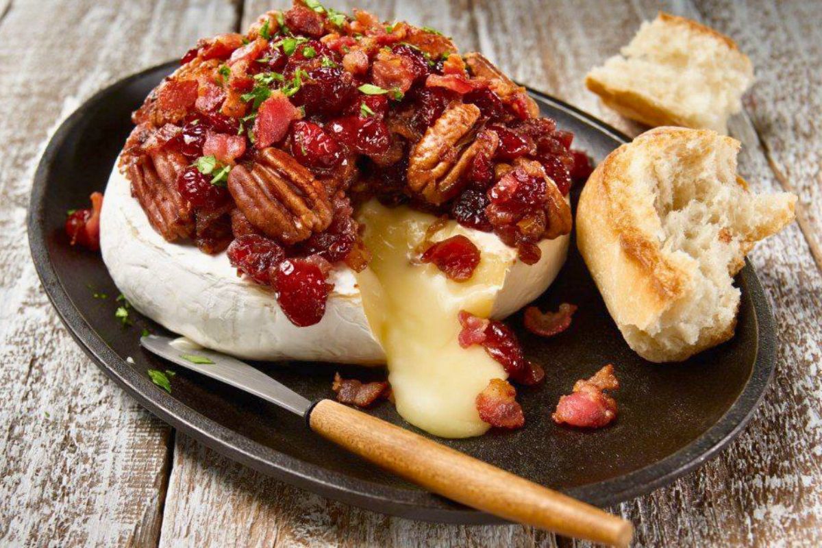 French Touch Café baked brie with cranberries, pecans, and fresh bread in Bolungarvík, Westfjords.