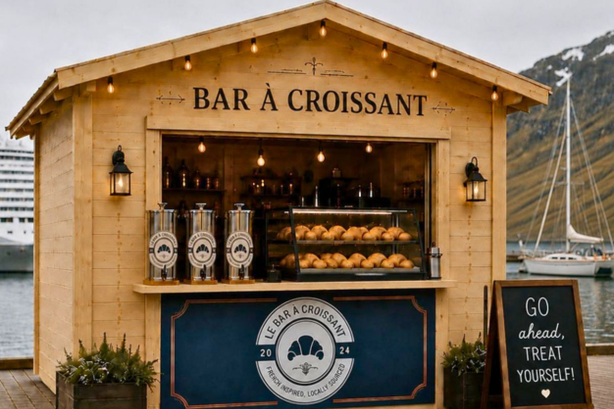 Bar à Croissant bakery kiosk at Ísafjörður harbor with fresh croissants and waterfront views,recommended by Handpicked Iceland.