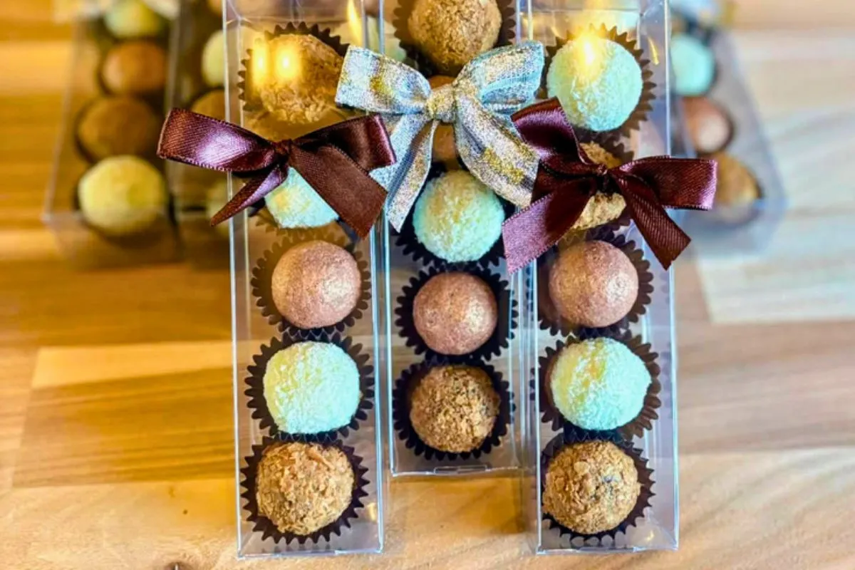 Clear plastic gift sleeves filled with assorted coconut and chocolate truffles by Neskja - Chocolate Confectionery in Grandavik. South Iceland.